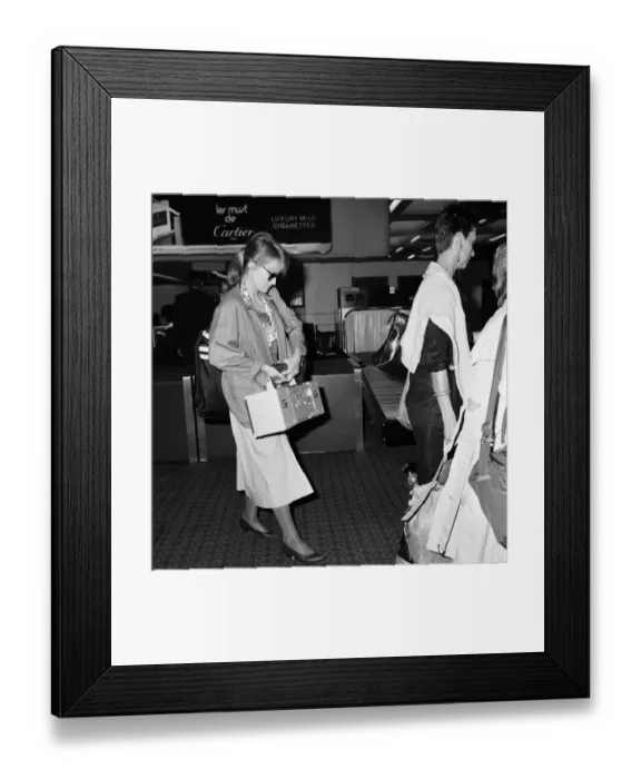 Framed Print : Meryl Streep pictured departing from Heathrow to New York. 14th July 1984 Framed Print : Meryl Streep pictured departing from Heathrow to New York. 14th July 1984