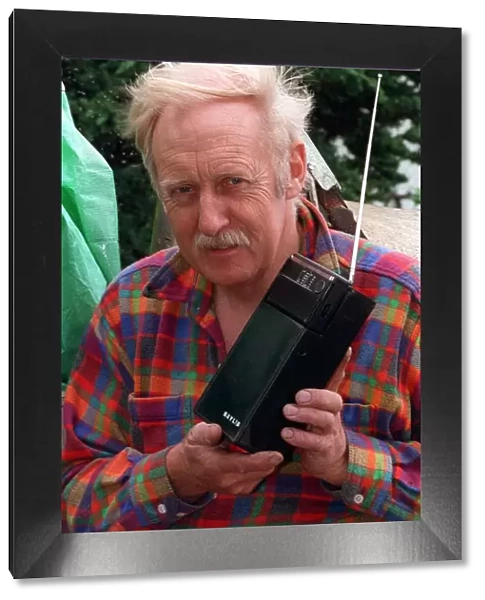 Inventor Trevor Baylis with his clockwork radio 1993
