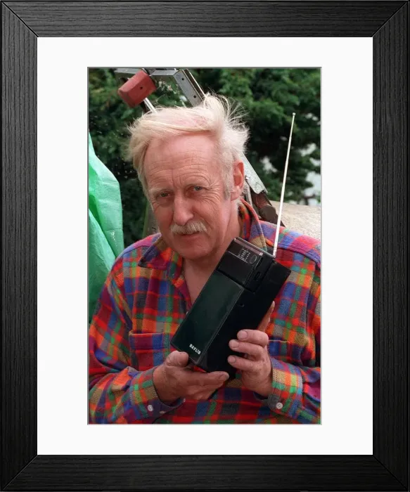 Framed Print : Inventor Trevor Baylis with his clockwork radio 1993