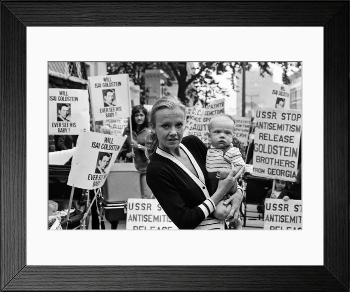 Framed Print : Actress Hayley Mills and her six month old baby Crispian attend a staged demonstration Framed Print : Actress Hayley Mills and her six month old baby Crispian attend a staged demonstration