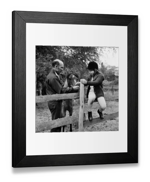 Framed Print : Stirling Moss and his daughter Allison (aged 7) with her horse Happy Framed Print : Stirling Moss and his daughter Allison (aged 7) with her horse Happy