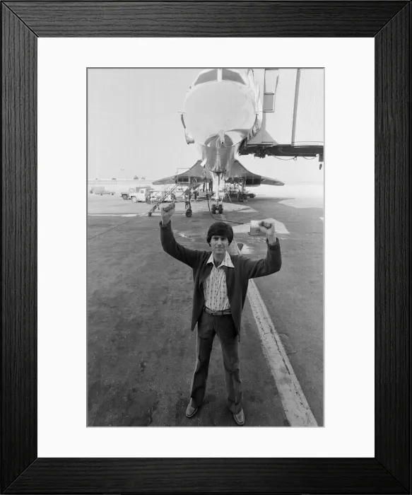 Framed Print : Uri Geller at London Airport standing in front of a Concorde. 1st November 1978 Framed Print : Uri Geller at London Airport standing in front of a Concorde. 1st November 1978