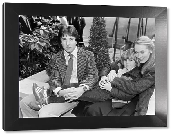 Actor Dustin Hoffman with actress Meryl Streep and young Justin Henry who all star