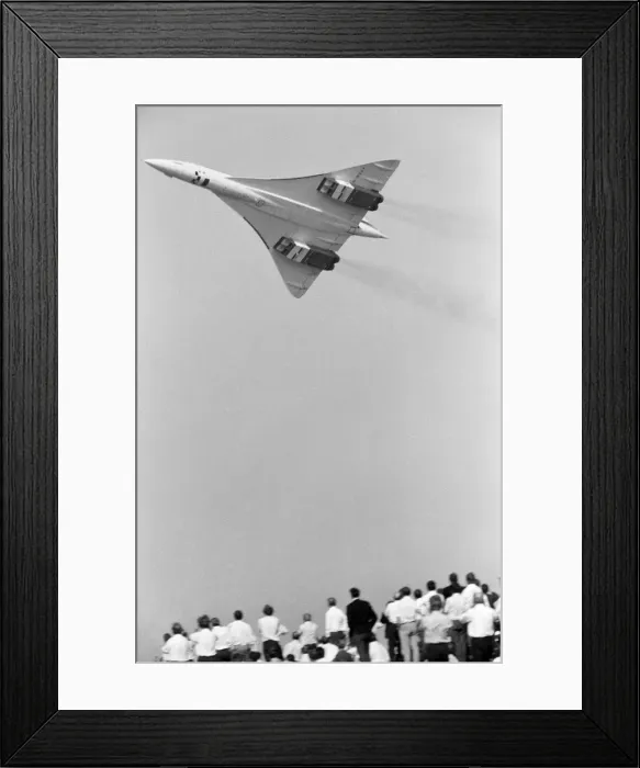 Framed Print : The Concorde makes its first appearance at Farnborough Air Show by flying low over