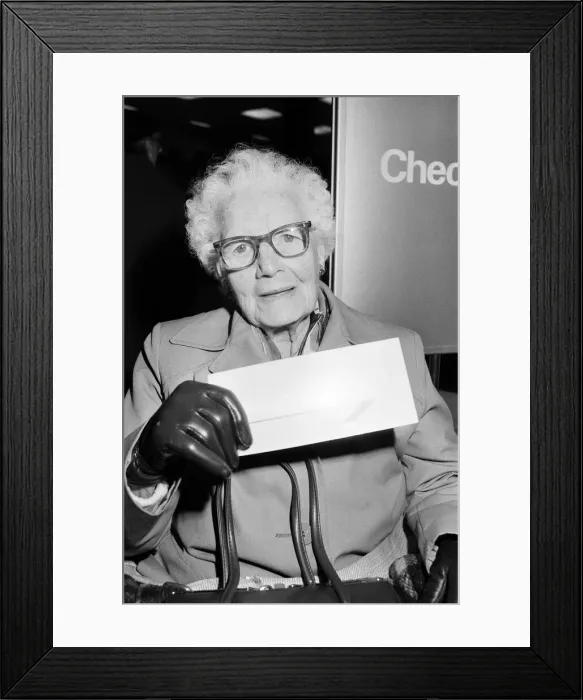 Framed Print : Concorde passenger holding her ticket. 2nd April 1986 Framed Print : Concorde passenger holding her ticket. 2nd April 1986