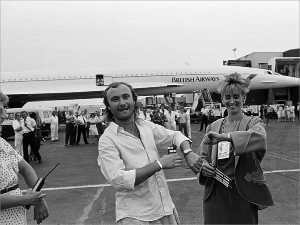 Singer Phil Collins & wife Jill Travelman at London Heathrow Airport