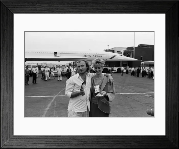 Framed Print : Singer Phil Collins & wife Jill Travelman at London Heathrow Airport Framed Print : Singer Phil Collins & wife Jill Travelman at London Heathrow Airport