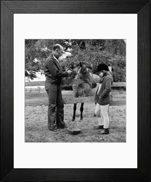Framed Print : Stirling Moss and his daughter Allison (aged 7) with her horse Happy
