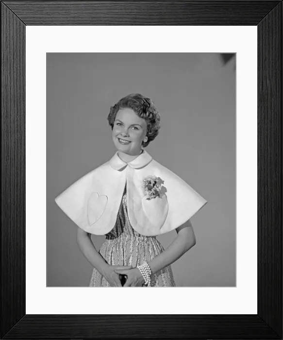 Framed Print : Model Maureen Denham seen here wearing a felt Cape made from a Reveille readers pattern Framed Print : Model Maureen Denham seen here wearing a felt Cape made from a Reveille readers pattern
