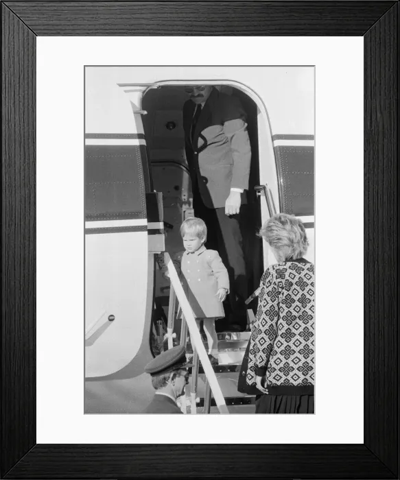 Framed Print : Prince Harry and his mother Princess Diana, arrive at Heathrow Airport, London Framed Print : Prince Harry and his mother Princess Diana, arrive at Heathrow Airport, London