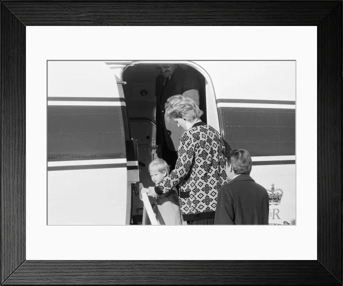 Framed Print : Prince Harry and his mother Princess Diana, arrive at Heathrow Airport, London Framed Print : Prince Harry and his mother Princess Diana, arrive at Heathrow Airport, London
