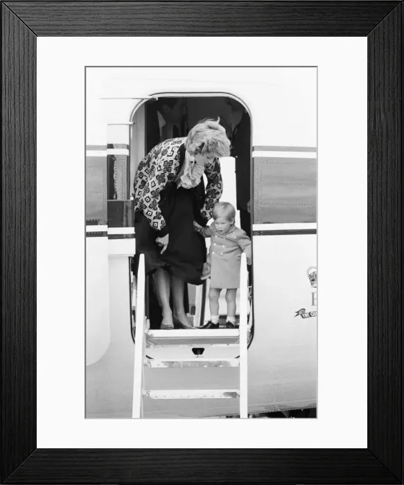 Framed Print : Prince Harry and his mother Princess Diana, arrive at Heathrow Airport, London Framed Print : Prince Harry and his mother Princess Diana, arrive at Heathrow Airport, London