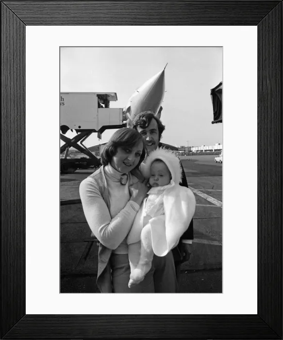 Framed Print : Mr and Mrs Frith with their 6 month old daughter Kathy on their arrival at Heathrow Framed Print : Mr and Mrs Frith with their 6 month old daughter Kathy on their arrival at Heathrow