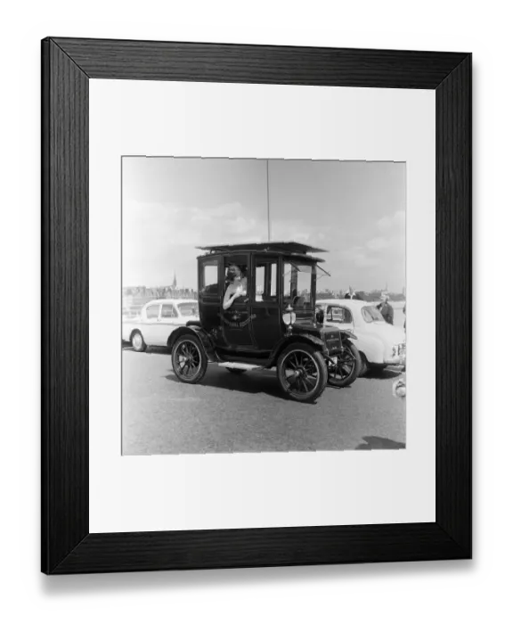 Framed Print : A revolutionary car driven by sun power. The veteran car has solar cells on the roof Framed Print : A revolutionary car driven by sun power. The veteran car has solar cells on the roof