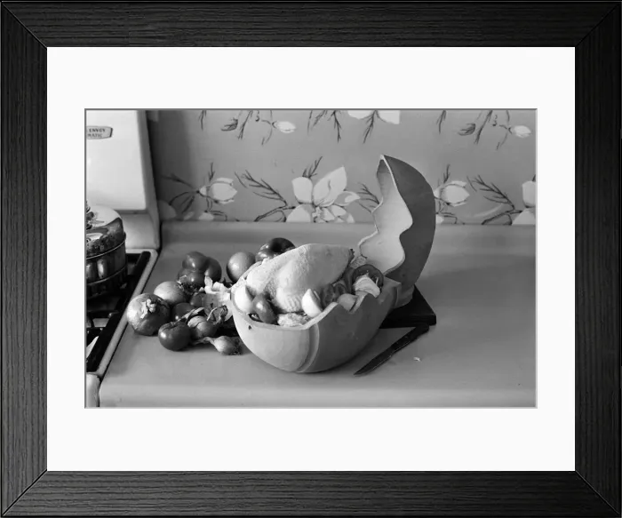 Framed Print : A woman in a kitchen cooking a chicken with a Bobo Pot. 29th March 1967 Framed Print : A woman in a kitchen cooking a chicken with a Bobo Pot. 29th March 1967