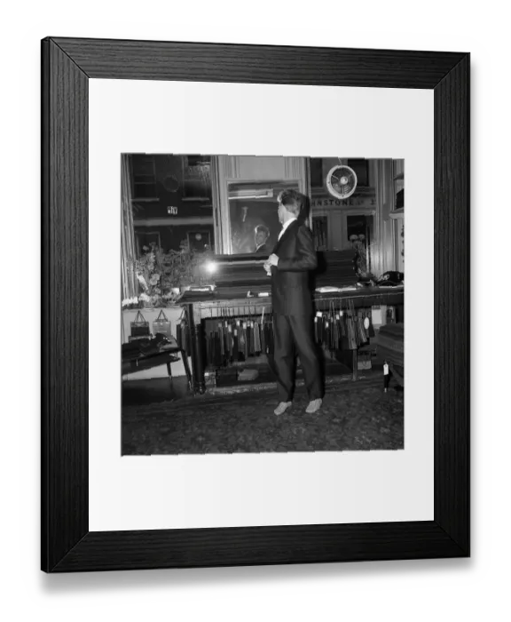 Framed Print : Singer and Actor Tommy Steele tries on his wedding suit. 1960 Framed Print : Singer and Actor Tommy Steele tries on his wedding suit. 1960