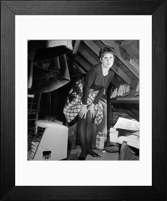 Framed Print : Dancer Una Stubbs, aged 22, in her flat in London. Inside the attic cupboard about to Framed Print : Dancer Una Stubbs, aged 22, in her flat in London. Inside the attic cupboard about to