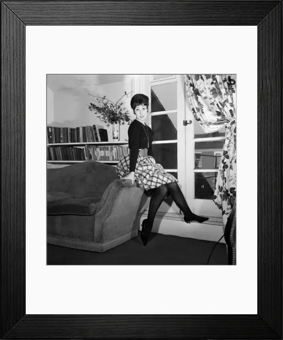 Framed Print : Dancer Una Stubbs, aged 22, in her flat in London. 4th December 1959