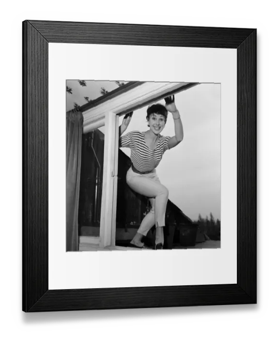 Framed Print : Dancer Una Stubbs, aged 22, in her flat in London. Outside Una