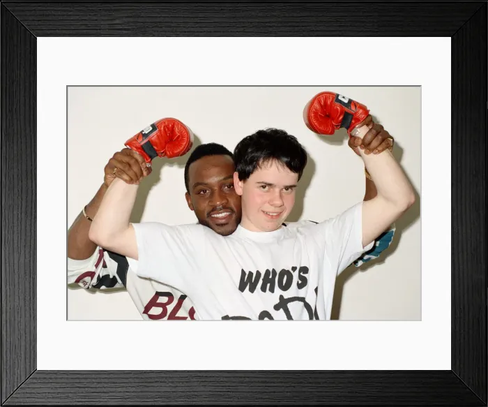 Framed Print : Former WBO middleweight champion Nigel Benn with boxer Richard Ross. 6th March 1990 Framed Print : Former WBO middleweight champion Nigel Benn with boxer Richard Ross. 6th March 1990