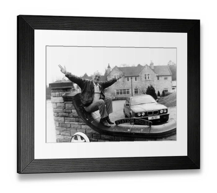 Framed Print : Jim Bowen outside his house Dbase
