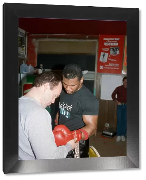 Mike Tyson in his training camp with Kevin Rooney ahead of his bout with James
