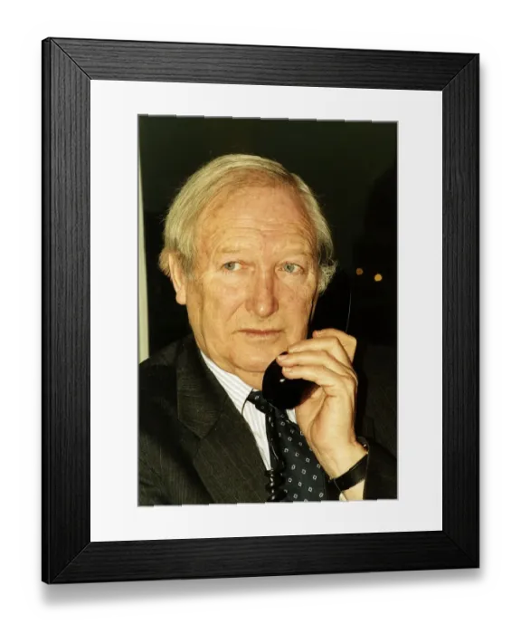 Framed Print : Ernie Burrington MGN chairman holding a telephone
