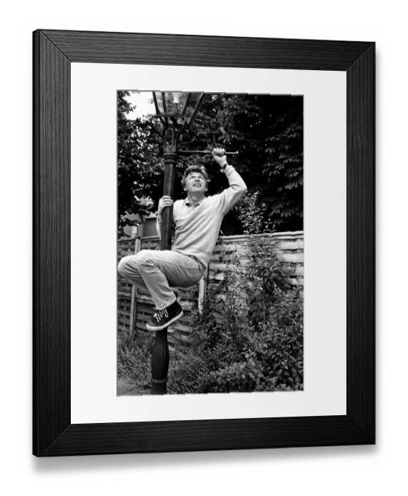 Framed Print : President of Bermondsey Boat Club Tommy Steele relaxes at his Thames side house