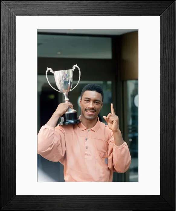 Framed Print : Michael Watson with the British Commonwealth middleweight trophy after defeating Nigel Framed Print : Michael Watson with the British Commonwealth middleweight trophy after defeating Nigel