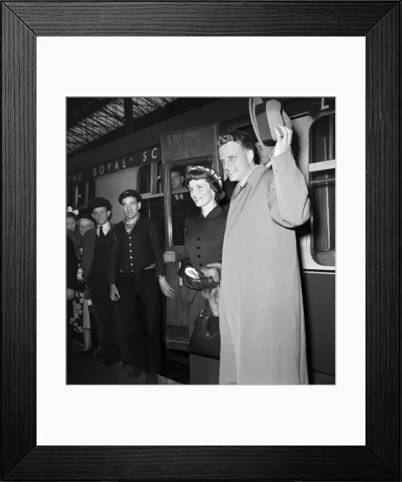 Framed Print : American evangelist Billy Graham arrives with his wife Ruth at Euston Station in London Framed Print : American evangelist Billy Graham arrives with his wife Ruth at Euston Station in London