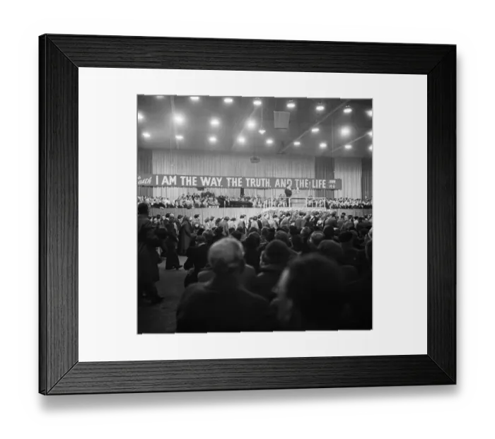 Framed Print : American evangelist Billy Graham addressing a huge crowd of people at Kelvin Hall in