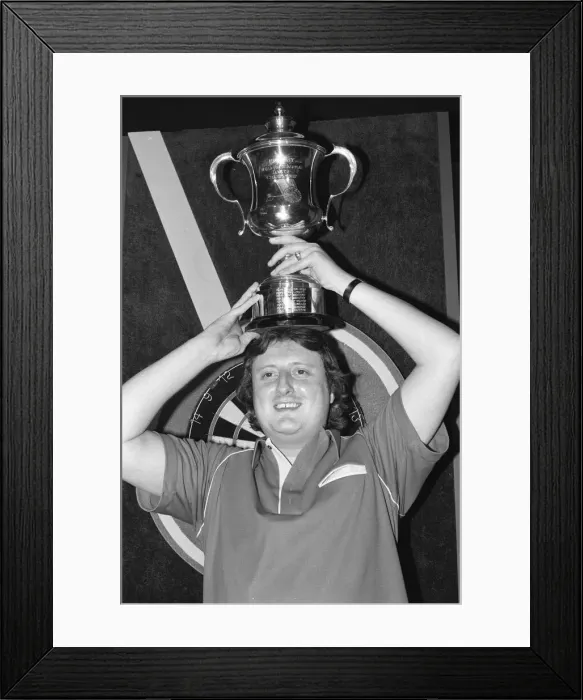 Framed Print : British dart player Eric Bristow celebrates his victory in the Embassy Darts World Framed Print : British dart player Eric Bristow celebrates his victory in the Embassy Darts World
