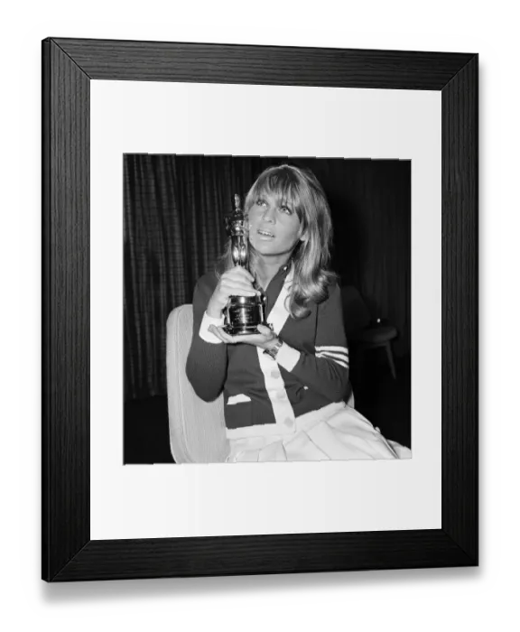 Framed Print : Julie Christie and boyfriend Don Bessant arriving at London Airport after she was awarded