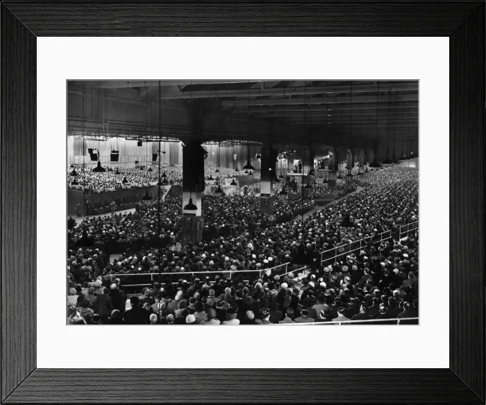 Framed Print : American evangelist Billy Graham addressing a huge crowd of people at Kelvin Hall in
