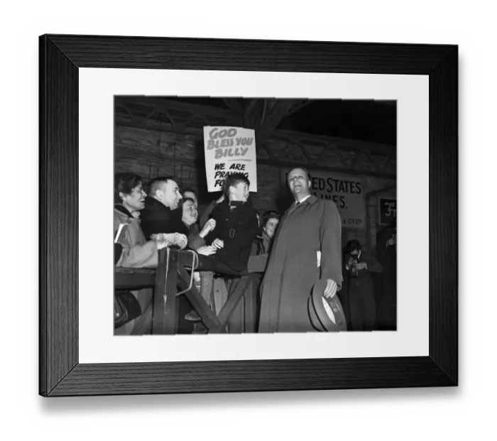 Framed Print : American evangelist Billy Graham salutes the huge crowd who gathered to welcome him