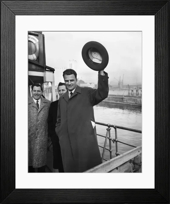 Framed Print : American evangelist Billy Graham salutes the huge crowd who gathered to welcome him
