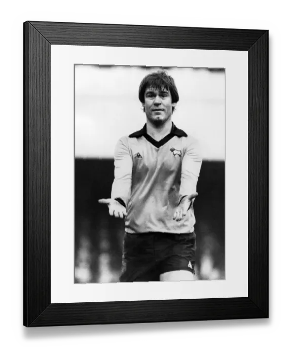 Framed Print : Derbys David Webb makes a point during a recent match. Circa 1980 Framed Print : Derbys David Webb makes a point during a recent match. Circa 1980