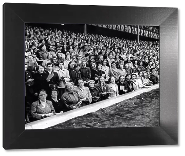 Billy Graham crusade. Crowds sing at Hampden Park in front of main South stand