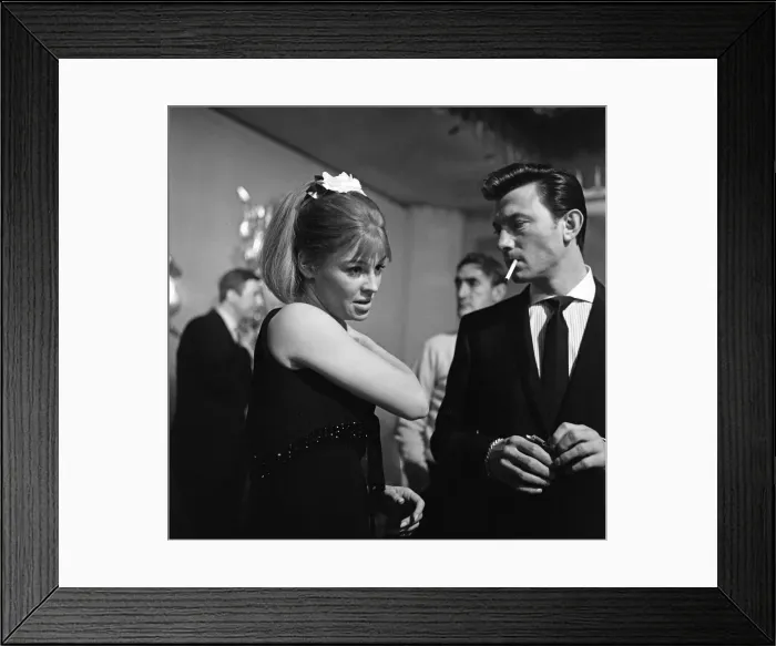 Framed Print : Laurence Harvey and Julie Christie shooting nightclub scenes for their film