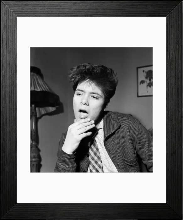 Framed Print : Rock and roll singer Cliff Richard who was attacked this evening whilst performing Framed Print : Rock and roll singer Cliff Richard who was attacked this evening whilst performing