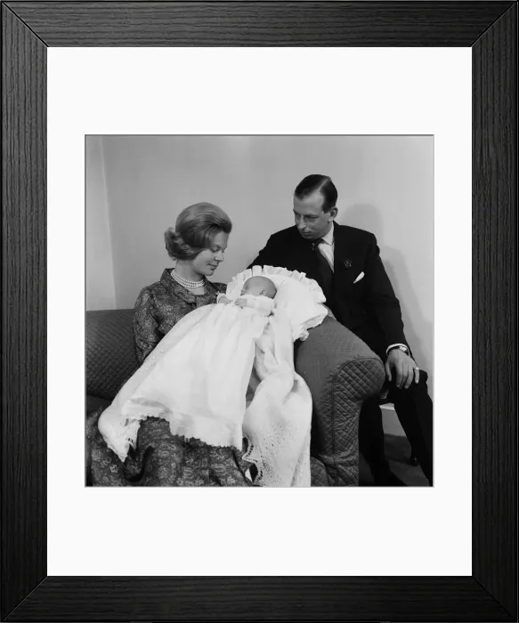 Framed Print : The Duke and Duchess of Kent with their baby son, the Earl of St Andrews at their home Framed Print : The Duke and Duchess of Kent with their baby son, the Earl of St Andrews at their home