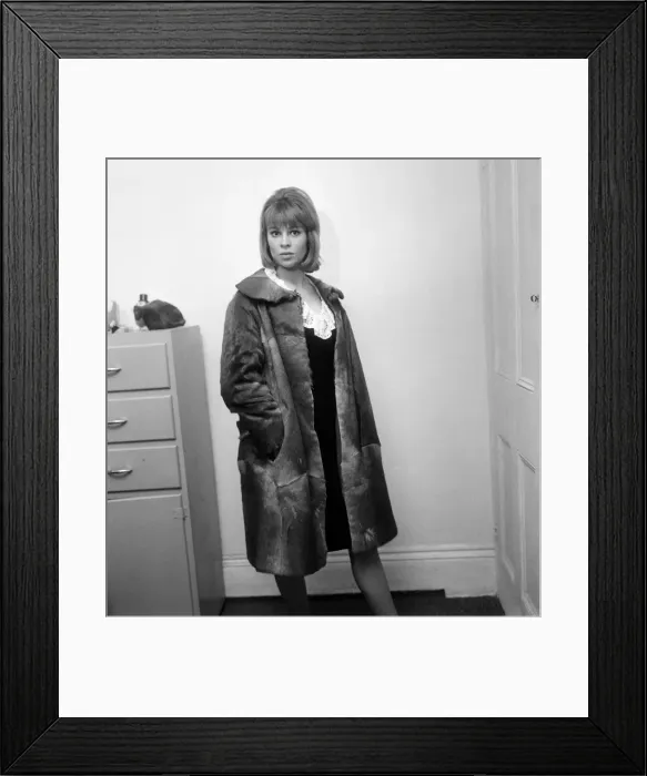 Framed Print : 21-year-old actress Julie Christie wearing a seal-skin coat. 29th January 1963