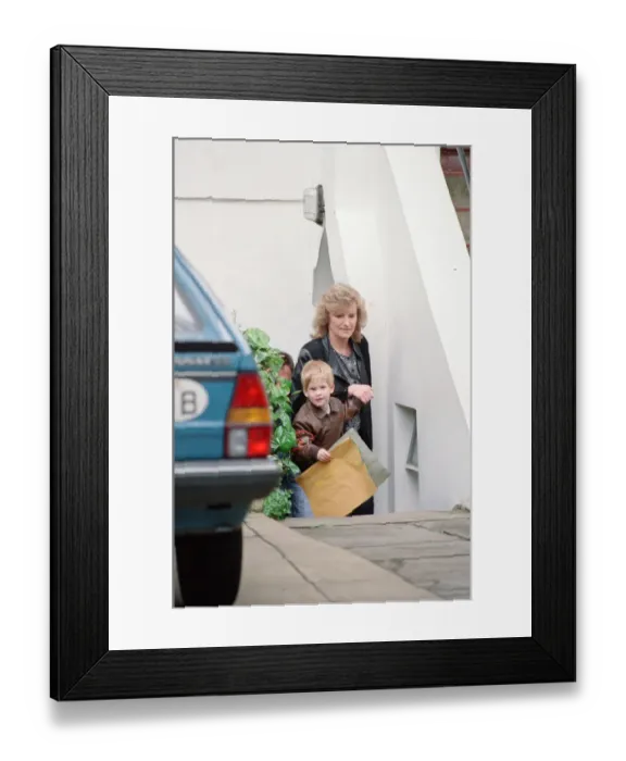 Framed Print : Prince Harry leaves nursery school at Chepstow Villas nursery in Kensington, West London Framed Print : Prince Harry leaves nursery school at Chepstow Villas nursery in Kensington, West London