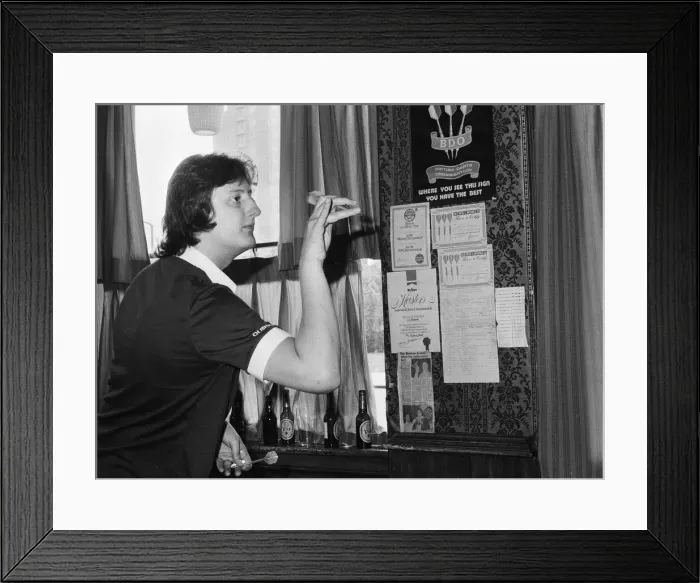 Framed Print : Twenty One year old British darts player Eric Bristow enjoying a friendly game at his Framed Print : Twenty One year old British darts player Eric Bristow enjoying a friendly game at his