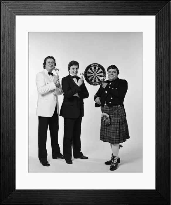 Framed Print : Well dressed British darts players pose for a photoshoot Framed Print : Well dressed British darts players pose for a photoshoot