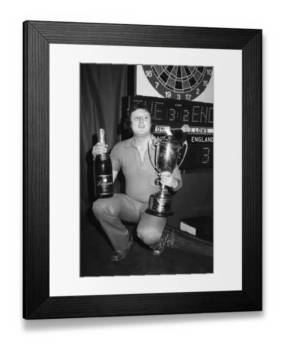 Framed Print : British darts player Eric Bristow celebrates his victory over John Lowe in the Final of Framed Print : British darts player Eric Bristow celebrates his victory over John Lowe in the Final of