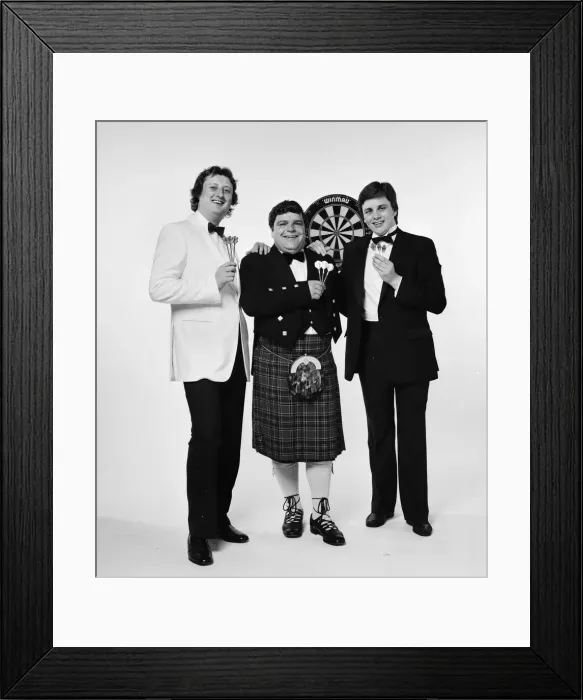 Framed Print : Well dressed British darts players pose for a photoshoot Framed Print : Well dressed British darts players pose for a photoshoot