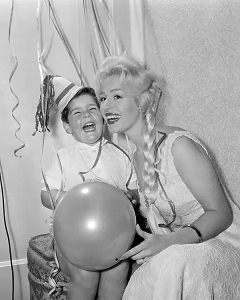 Sheree Winton and her 3 year old son Dale, have an early Christmas party