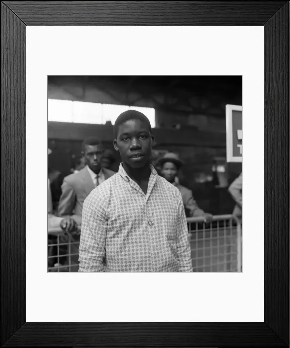 Framed Print : A West Indian immigrant arriving in the United Kingdom. 30th June 1962 Framed Print : A West Indian immigrant arriving in the United Kingdom. 30th June 1962