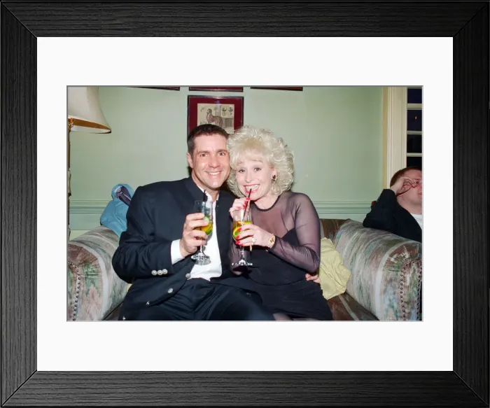 Framed Print : Dale Winton and Barbara Windsor share a nice moment at Dales birthday party